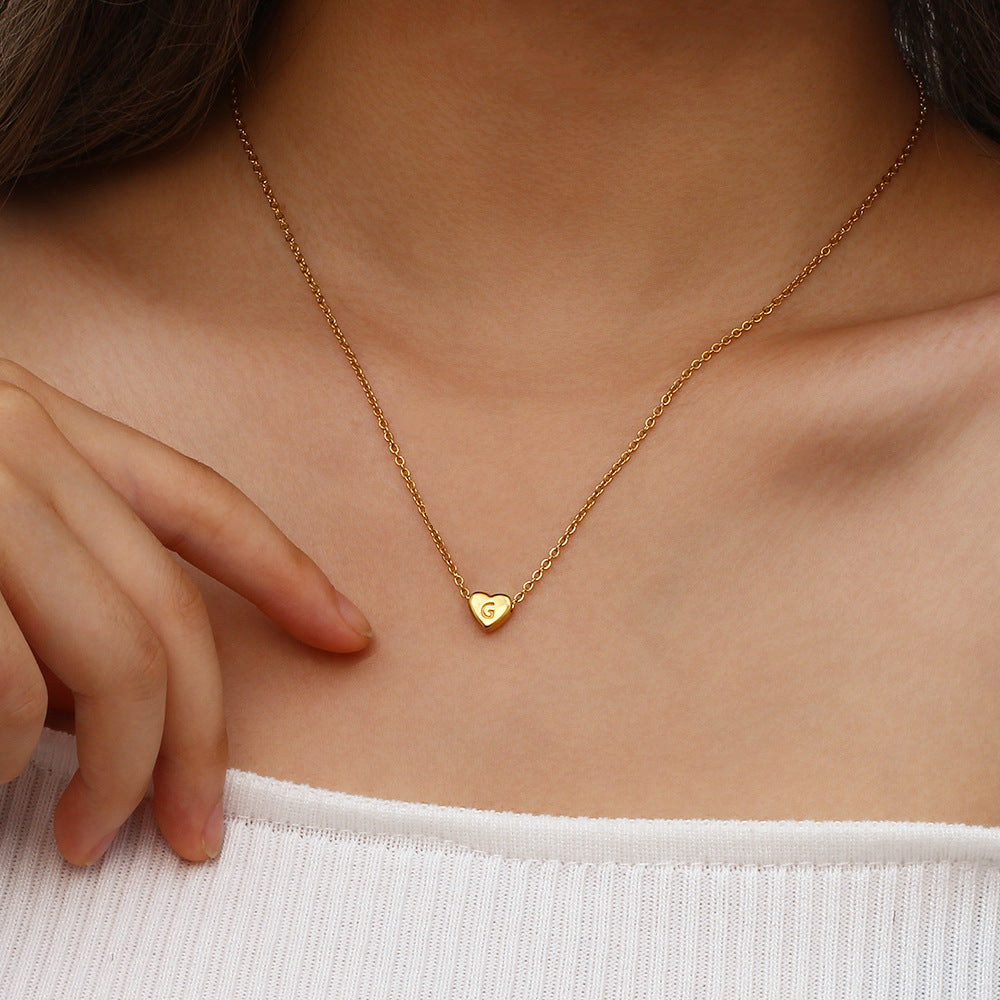 Corazón™ | Collar con colgante de corazón e inicial