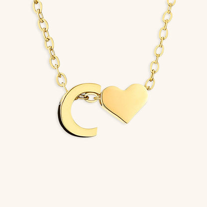 Ria™ | Collar en forma de corazón con iniciales