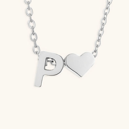 Ria™ | Collar en forma de corazón con iniciales