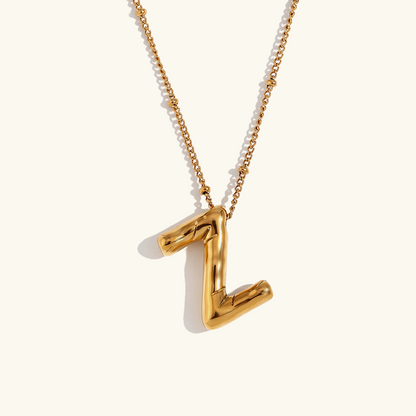Clarisa™ | Collar con inicial de oro